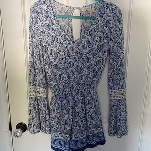 Hollister romper with flare sleeves.